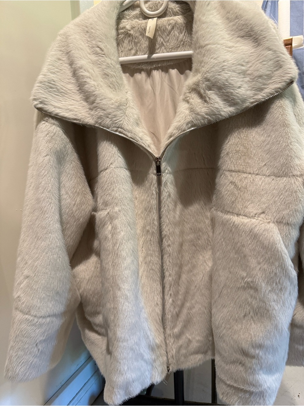 Women's Faux Fur Zip Jacket in cream/off white.